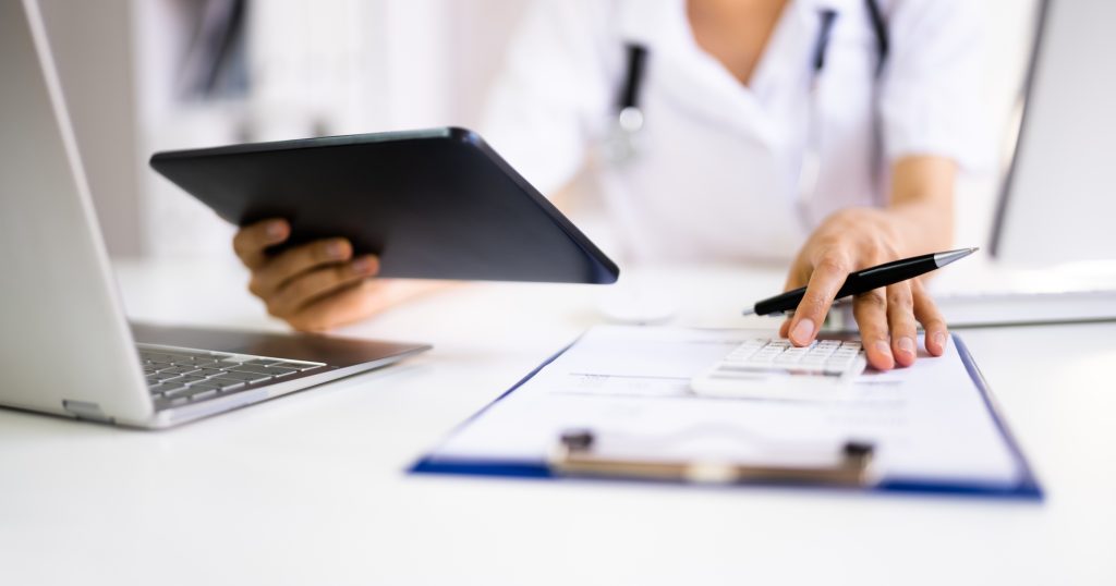  "Comparison image illustrating the benefits of medical billing software. On the left: a cluttered desk with stacks of papers and frustrated staff members. On the right: a digital workspace with smiling staff members, efficient processes, and graphs showing improved revenue and reduced errors."