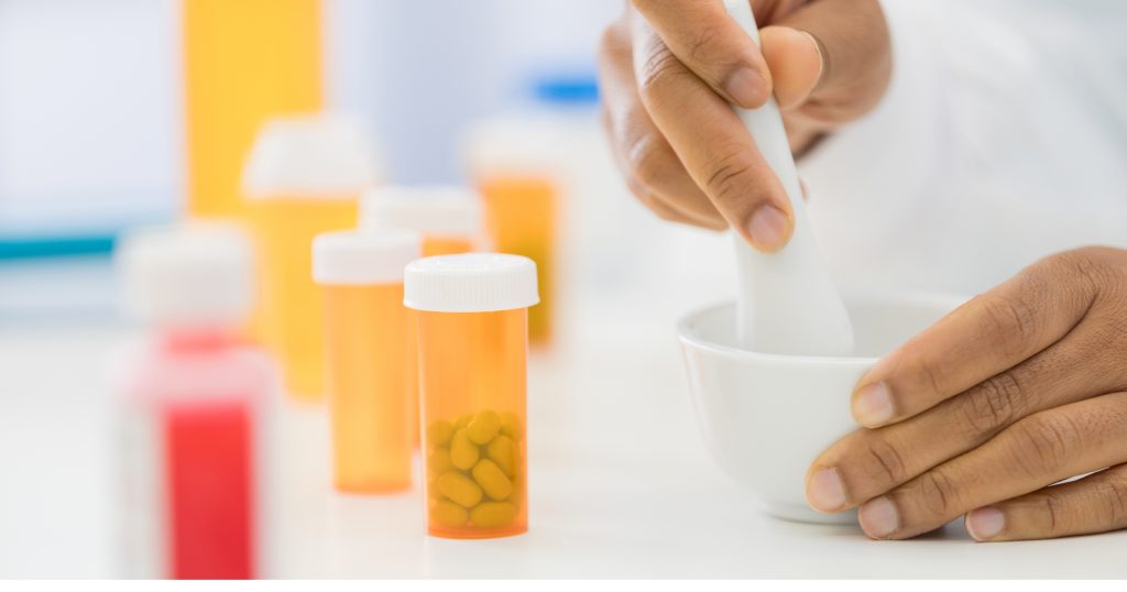 "Pharmacist Providing Patient Care" "Pharmacist counseling a patient on medication usage"