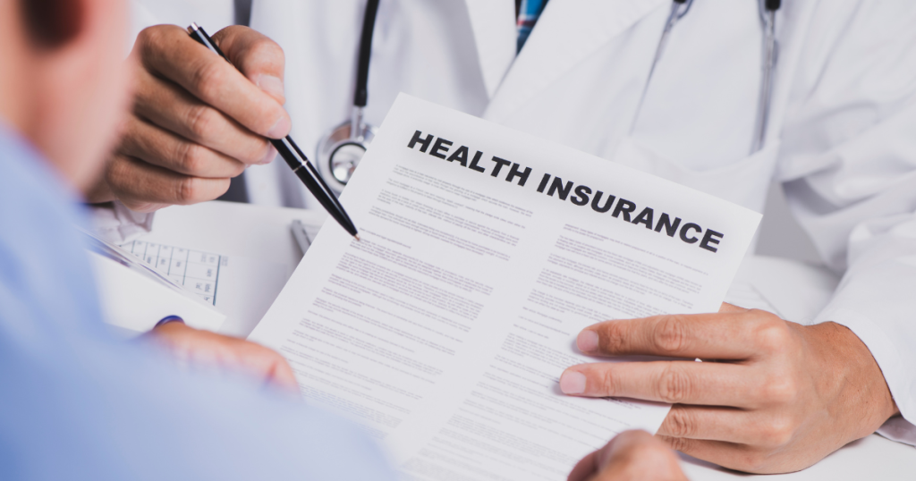  An insurance representative assisting a pregnant woman.