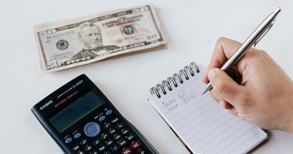 A couple reviewing finances or creating a budget plan.